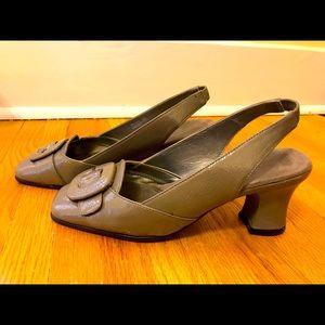 Patent leather sling back heels.